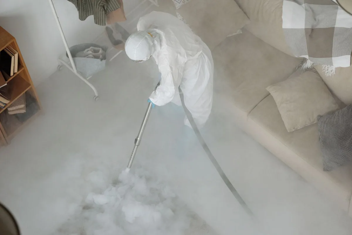 Biohazard cleanup technician in protective equipment, Semmes, AL